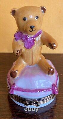 LIMOGES FRANCE PEINT MAIN TRINKET BOX Teddy Bear with Bow Sitting on a Pillow