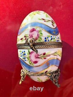 Limoges France Peint Main Porcelain Egg Trinket Box with Tea Set and Cherub Clasp