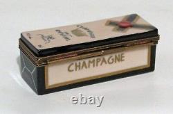 Limoges box hand painted and decorated in France Champagne box withbottle inside