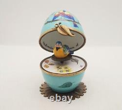 Plays Music French Limoges Trinket Box Tropical Bird Egg with Tropical Bird Key