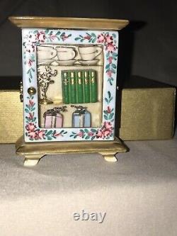 Rochard Limoges hand painted porcelain display case with books and trophies