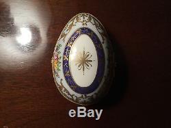 Signed CM Le Tallec Limoges egg shaped porcelain box hand painted floral design