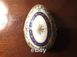 Signed CM Le Tallec Limoges egg shaped porcelain box hand painted floral design